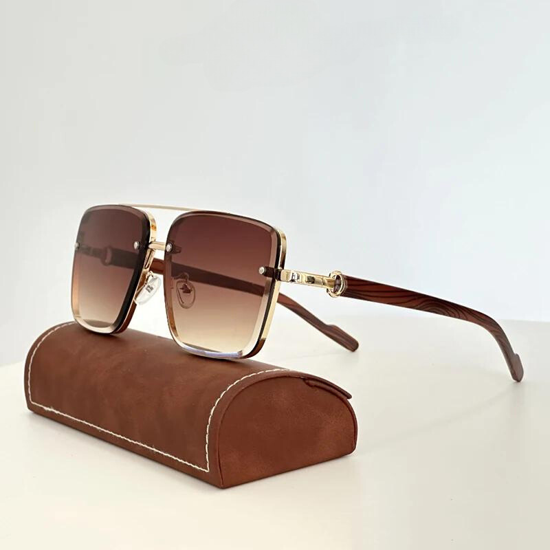 Elegant gold-frame sunglasses, a unisex fashion accessory with UV400 lenses for superior eye protection.