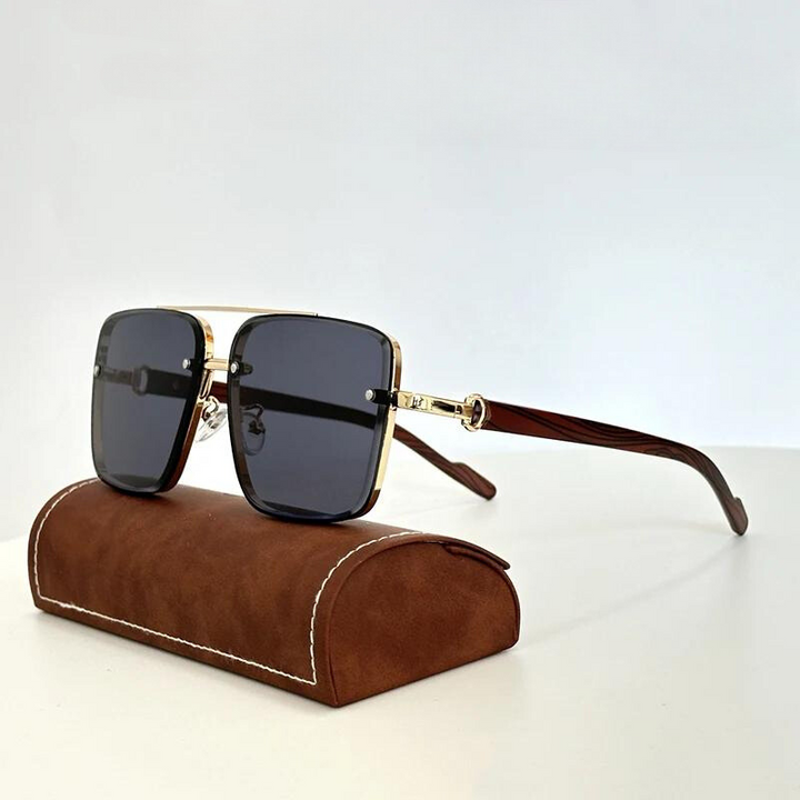 Stylish unisex gold-frame sunglasses, perfect fashion accessory for sun protection. Elegant metal eyewear with UV400.