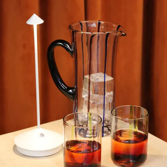Rechargeable ClarityGlow LED lamp, dimmable light, modern design for home & outdoor decor.