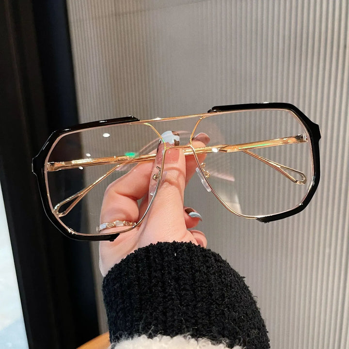 Stylish unisex aviator eyewear featuring a durable metal frame & UV protective tinted lenses.