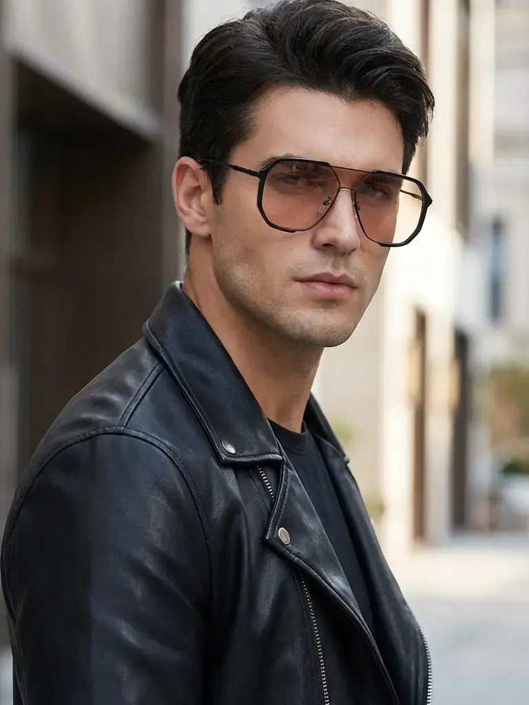 Close-up of sleek gold metal frame aviator sunglasses, showing intricate detailing & tinted lenses.