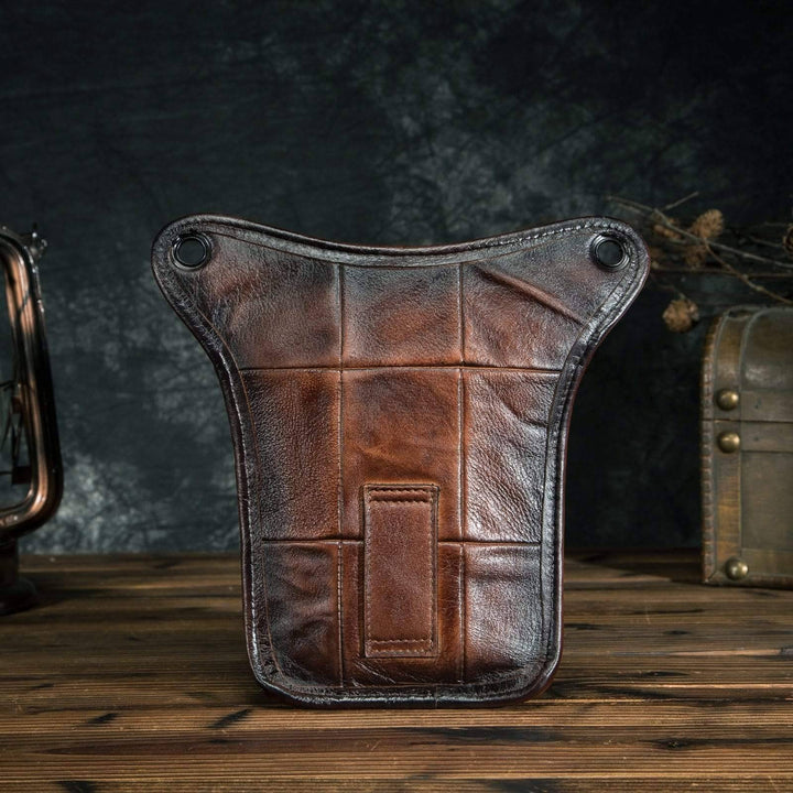 Front view of classic unisex leather sling bag, rich brown genuine cowhide shoulder pack