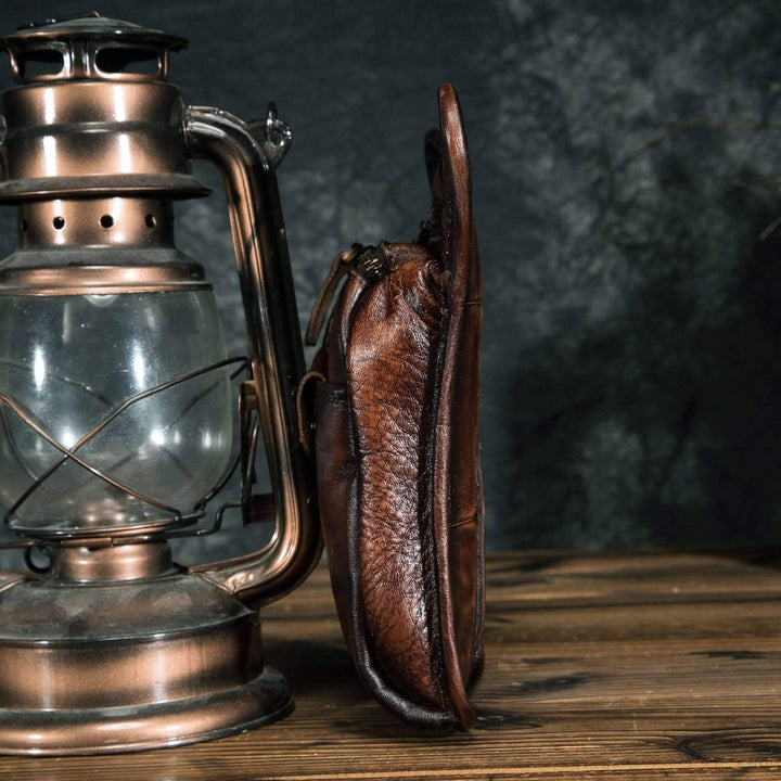 Side profile of versatile unisex leather shoulder bag, perfect waist pack for travel