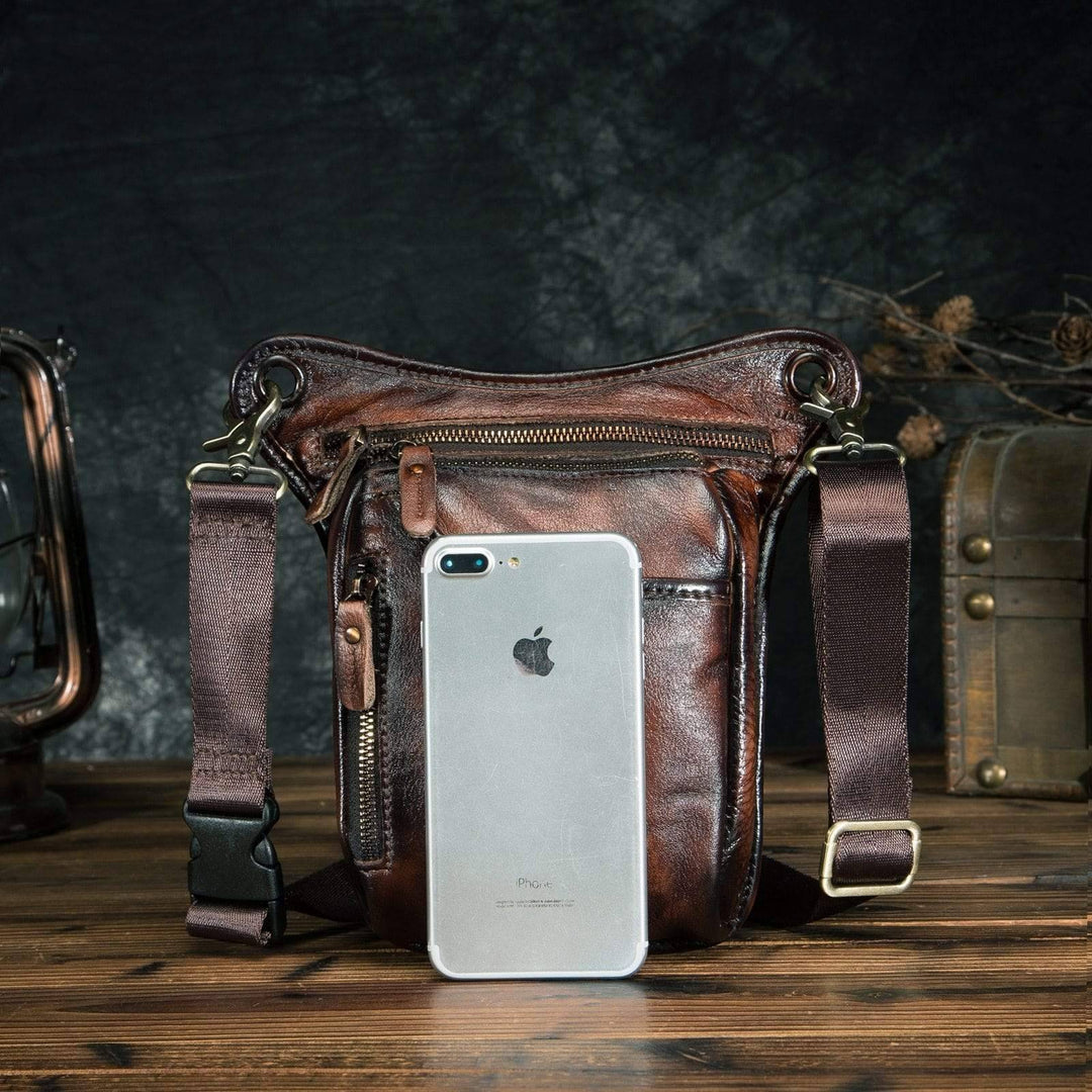 Unisex black genuine leather sling bag, sleek and durable cowhide for daily carry