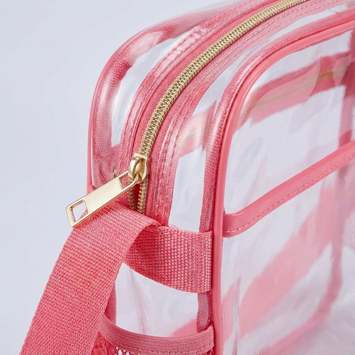 Stylish transparent shoulder bag, ideal for concerts & sports events. Keeps essentials secure & visible.