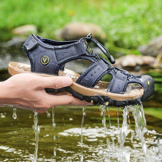 Durable outdoor footwear, closed toe hiking sandals in leather, built for comfort and adventure.
