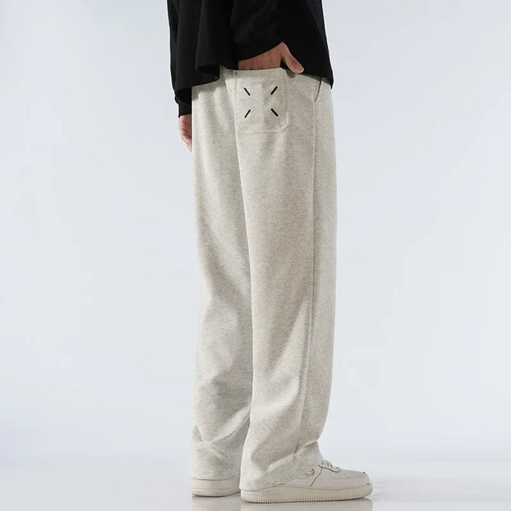 Drawstring wide-leg sweatpants, offering everyday comfort & versatile athleisure style for all.