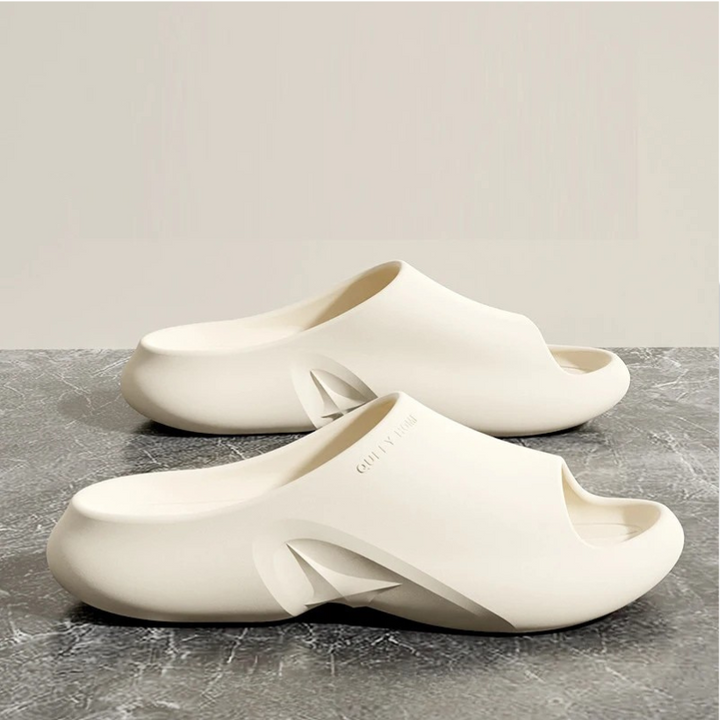 Cloud-soft EVA slides providing ultimate comfort. Lightweight, breathable unisex footwear for casual indoor/outdoor use.