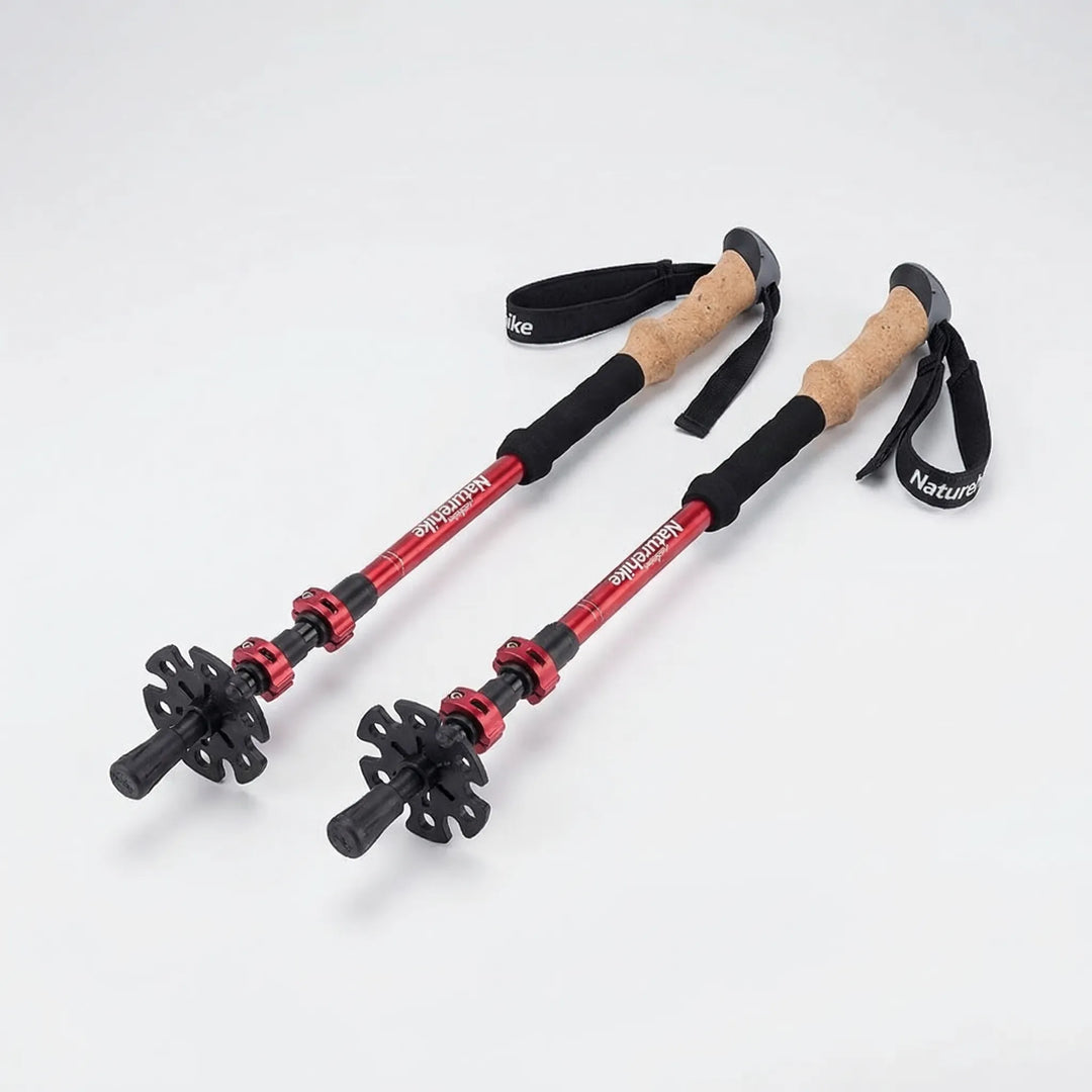 Versatile collapsible hiking poles, telescoping walking sticks for stability on trails, ultralight outdoor gear.