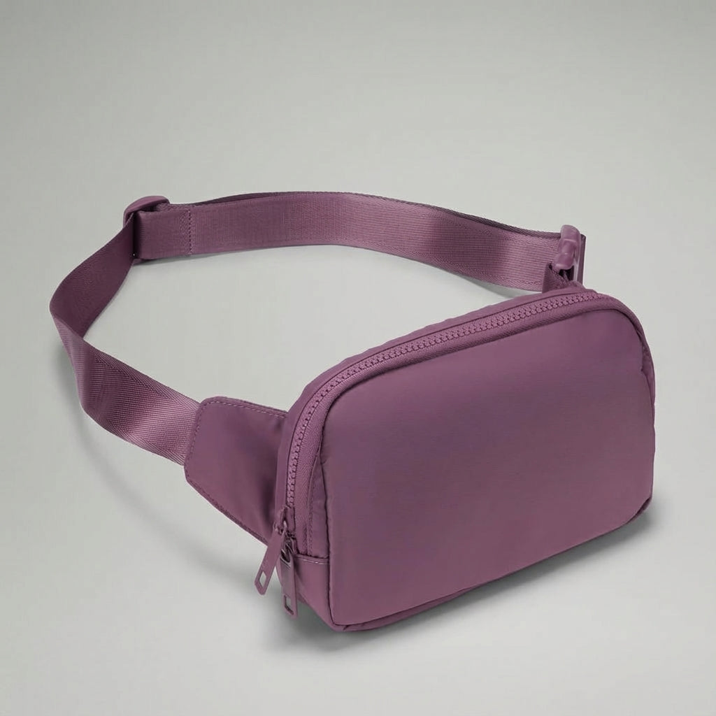 Durable nylon compact belt bag, water-resistant. Perfect unisex fanny pack for secure everyday carry.