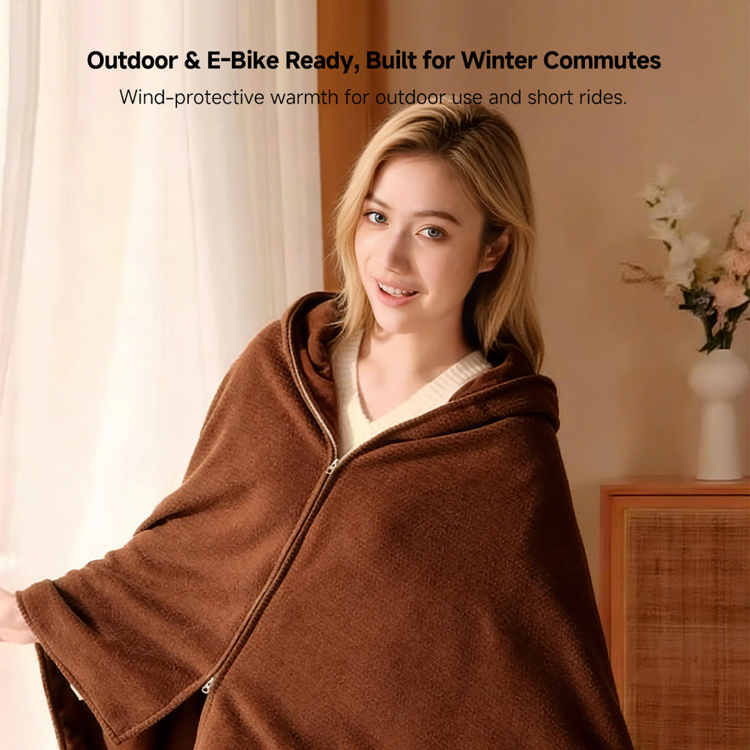 Person adjusting the unisex cordless graphene heated shawl, demonstrating its flexibility and wearability