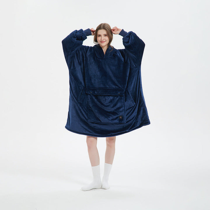 Unisex cordless heated flannel hoodie blanket folded neatly, highlighting its compact and portable design for winter.
