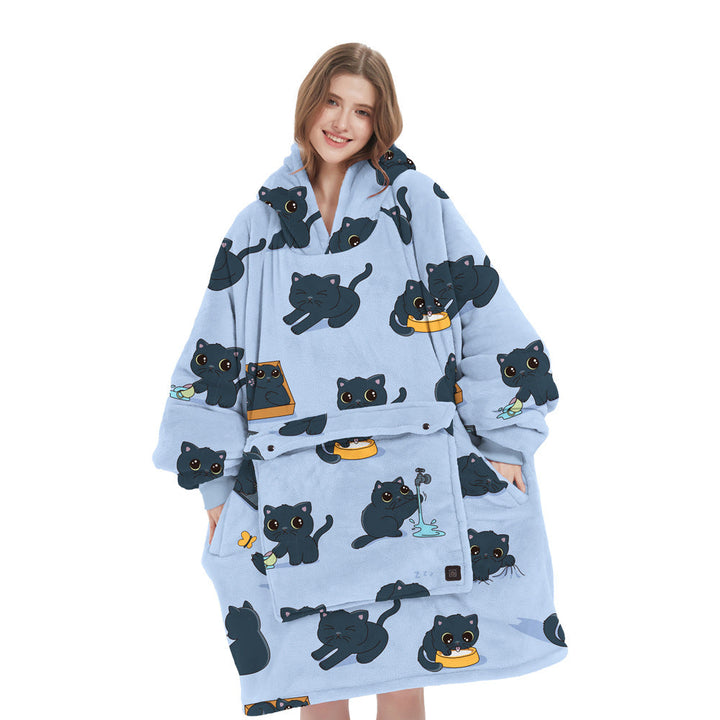 The power bank pocket on a cordless heated flannel hoodie blanket, demonstrating its practical USB charging feature.