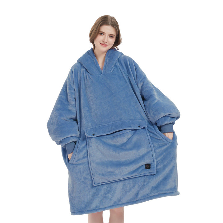 Person working from home, comfortably wrapped in a USB heated flannel hoodie blanket, staying warm and productive.
