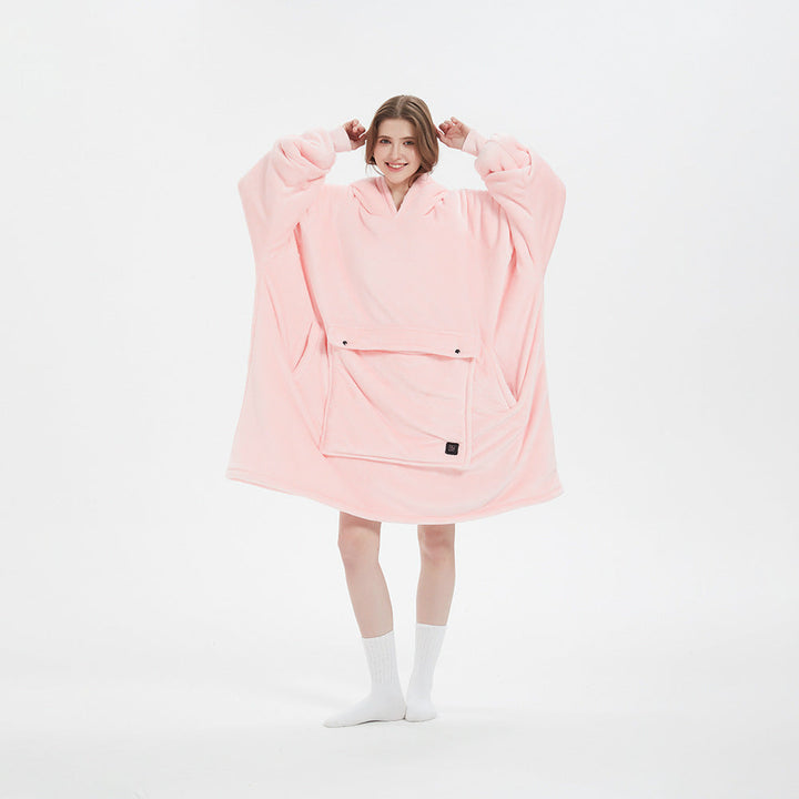 Product shot of the cordless heated flannel hoodie blanket, highlighting its soft fabric and functional design.