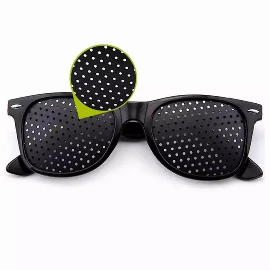 Unisex corrective pinhole glasses for natural vision improvement, reducing eye strain and enhancing focus daily.