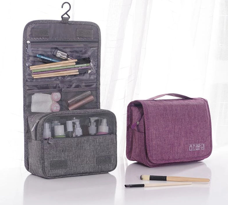 Unisex Deluxe Hanging Travel Toiletry Bag in black, ideal for organizing essentials.