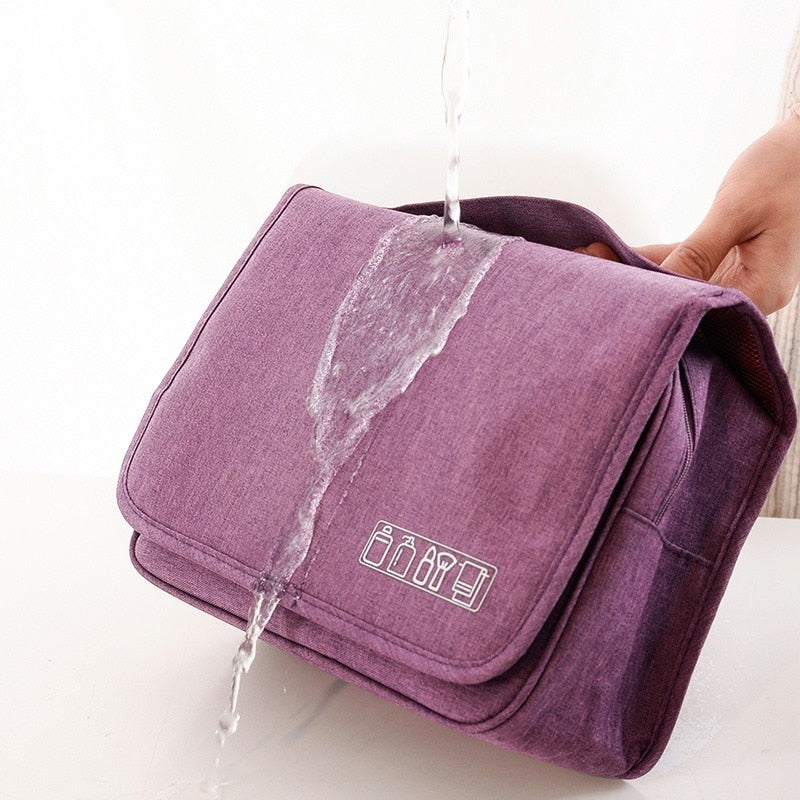 Elegant unisex travel essential, a hanging toiletry and cosmetic organizer for trips.
