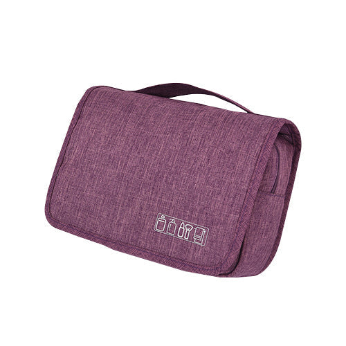 Open hanging toiletry bag displaying organized makeup and travel essentials.