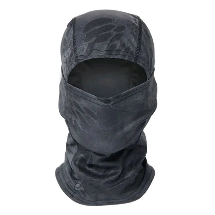Person wearing a tactical green camo balaclava, demonstrating full head and neck coverage