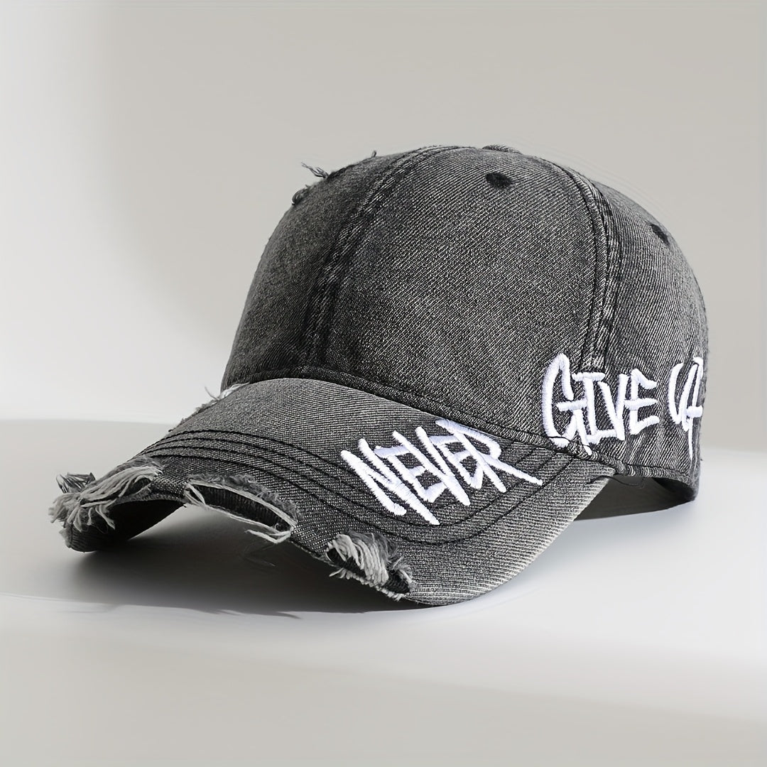 Distressed denim cap, "Never Give Up" embroidered. Unisex, frayed edge, casual wear baseball hat.