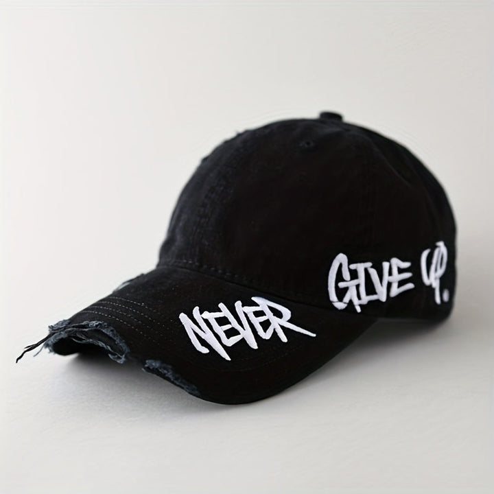 Frayed edge, distressed denim cap. Unisex "Never Give Up" baseball hat, adjustable for casual street style.