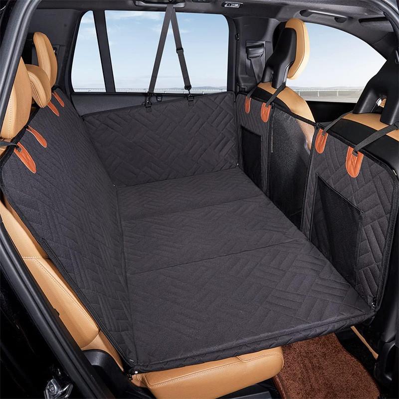 Waterproof pet car seat hammock with side flaps for vehicle protection. Ensures dog safety & easy cleaning.