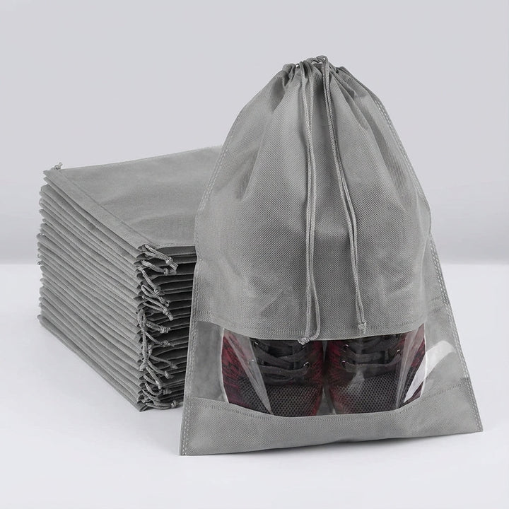 Unisex drawstring shoe bags for travel. Durable & reusable, provides dustproof & waterproof protection for footwear.