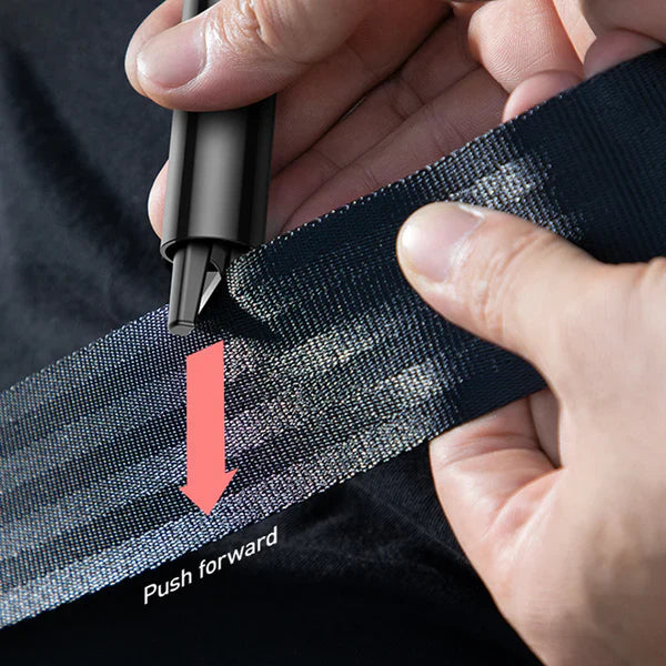 Close-up of a multi-functional car safety tool, highlighting the window breaker and seat belt cutter.