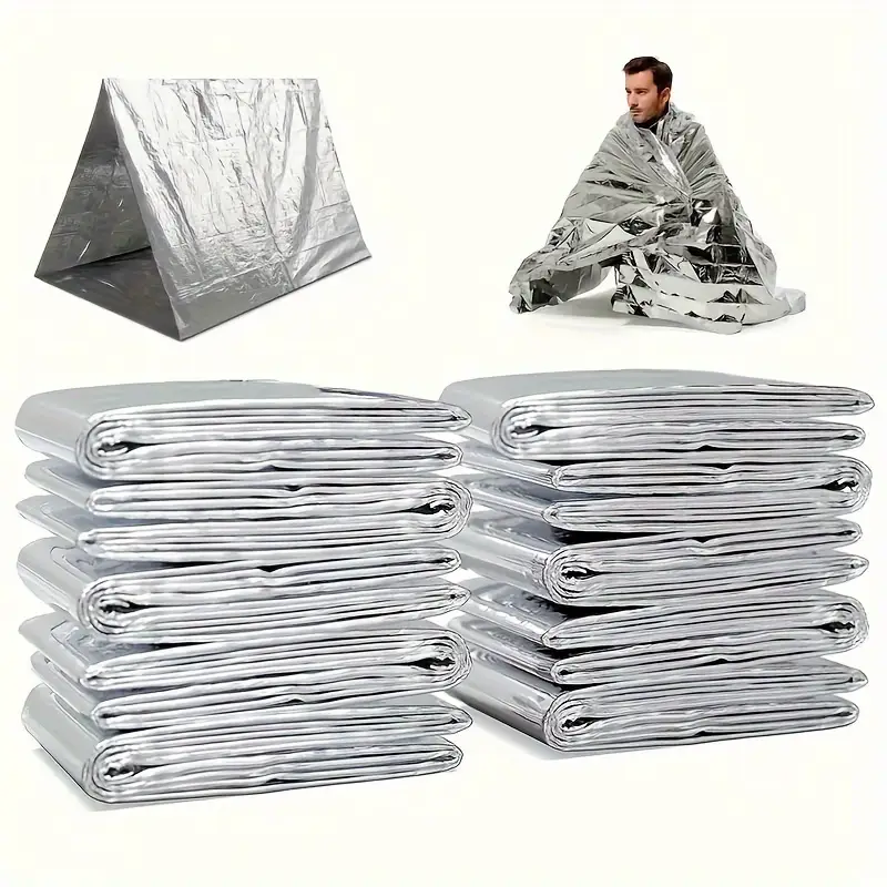 Silver Mylar space blanket, waterproof survival gear for warmth and protection in outdoor emergencies