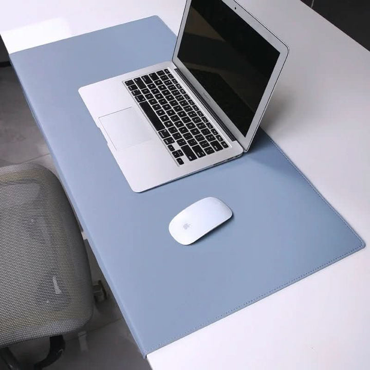 Workspace organizer: ergonomic PU leather desk mat with wrist support. Protects desk and improves setup.