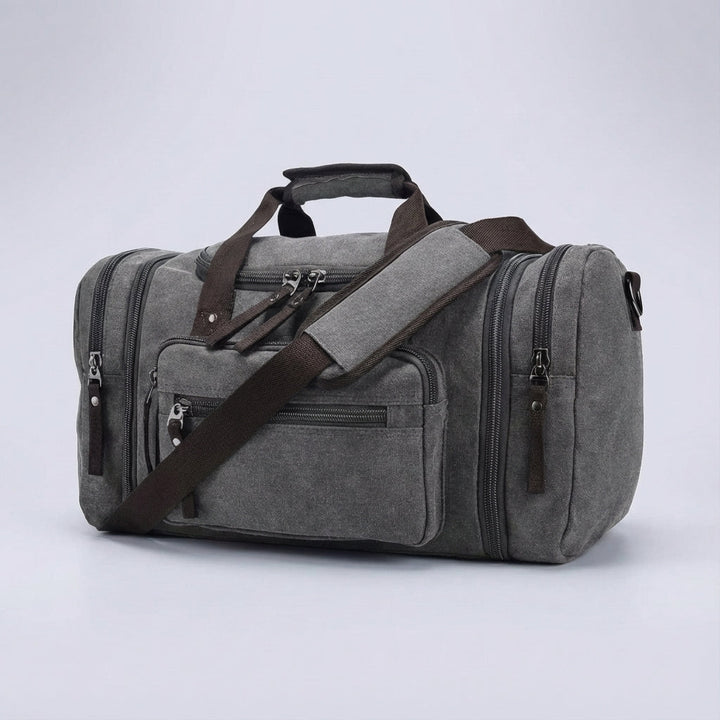 Unisex expandable canvas weekender. Durable travel duffel bag for efficient weekend trips & carry-on luggage.