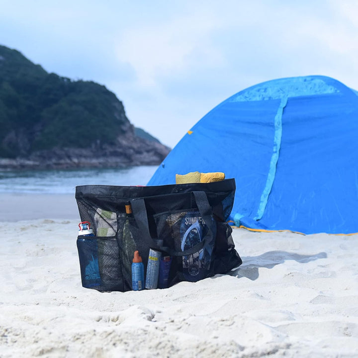 Modern unisex mesh beach tote with strong handles and a sandproof zipper. Ideal large capacity summer accessory.