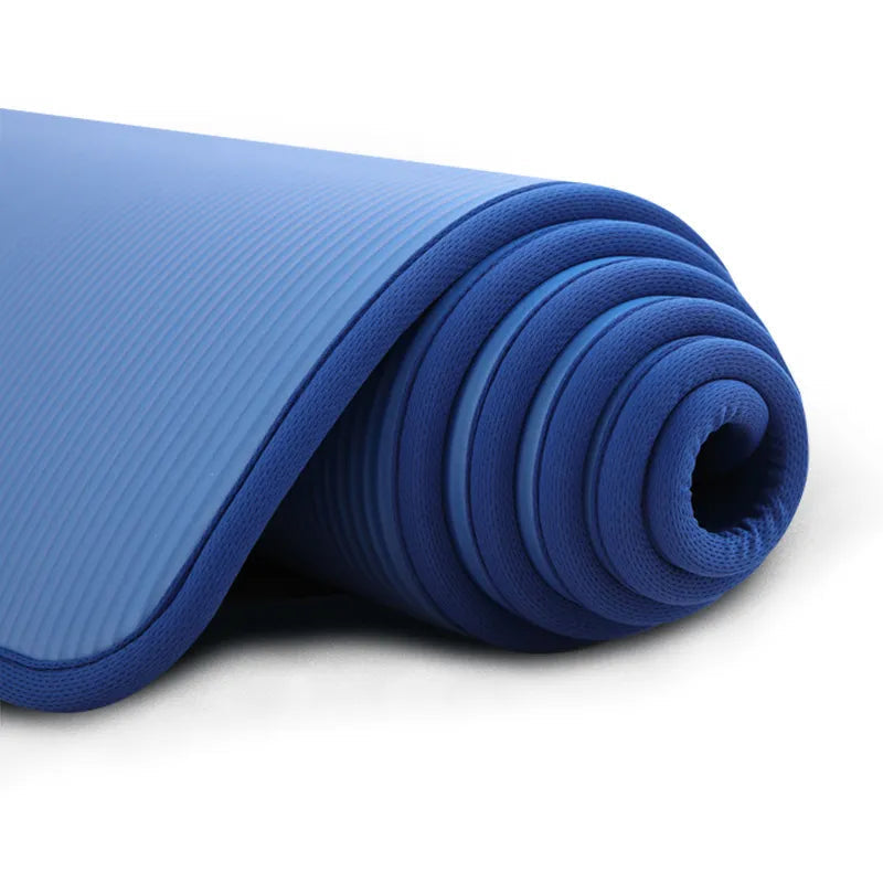 Durable, extra thick yoga mat for unisex use, featuring a non-slip surface for safe and comfortable floor exercises.
