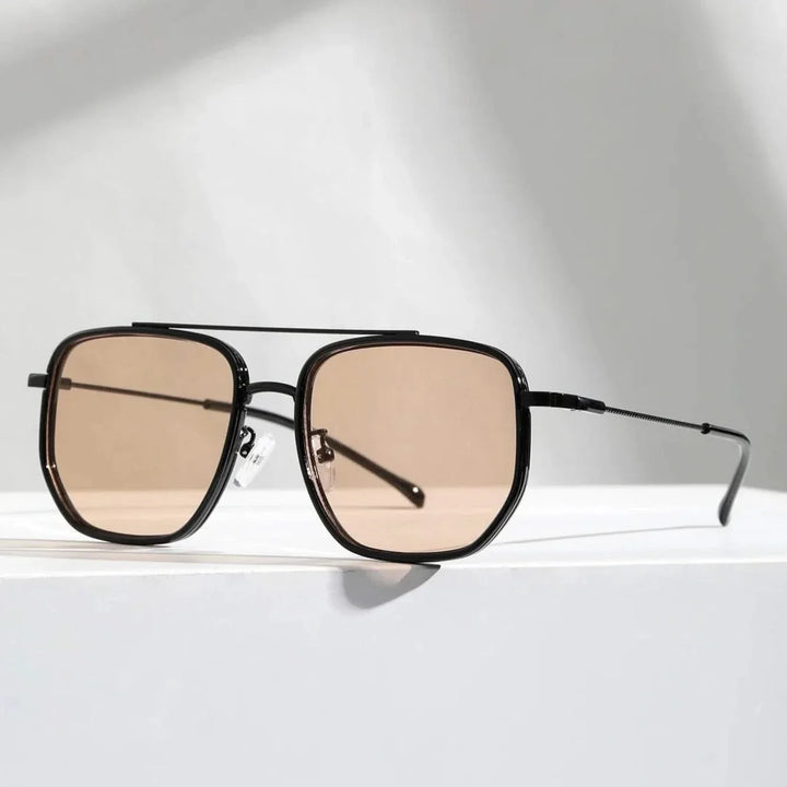 Sleek unisex eyewear: fashion sunglasses with advanced UV protection and durable metal frame.