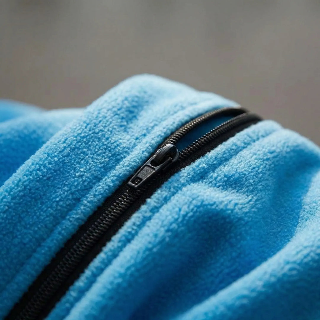 Versatile unisex fleece envelope sleeping bag for camping & outdoor adventures. Warm liner, lightweight.