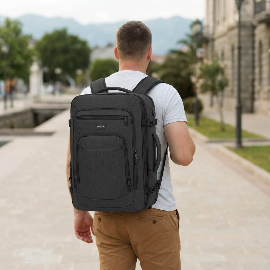Unisex FlightFold waterproof business travel backpack with anti-theft features & dedicated laptop compartment.