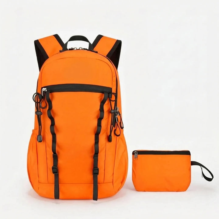 Lightweight cyan hiking daypack, foldable nylon, water-repellent for daily outdoor adventures.