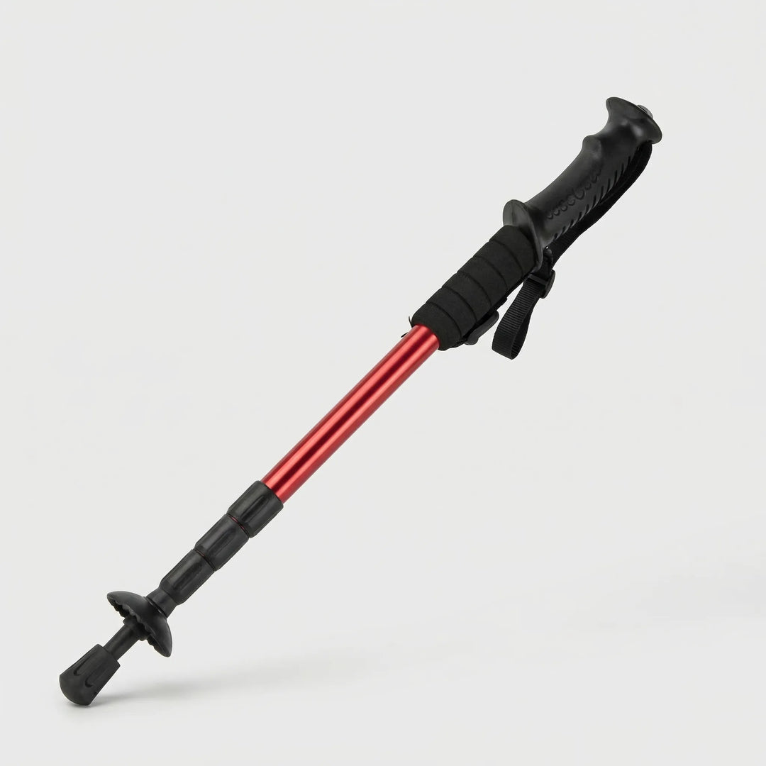 Adjustable folding walking stick for hiking, offering reliable support on various trails & camping trips.