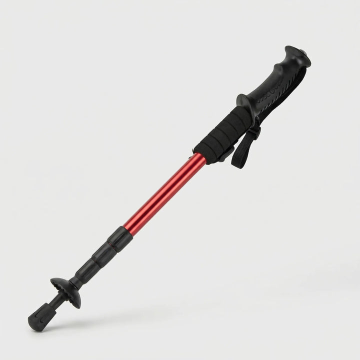 Adjustable folding walking stick for hiking, offering reliable support on various trails & camping trips.