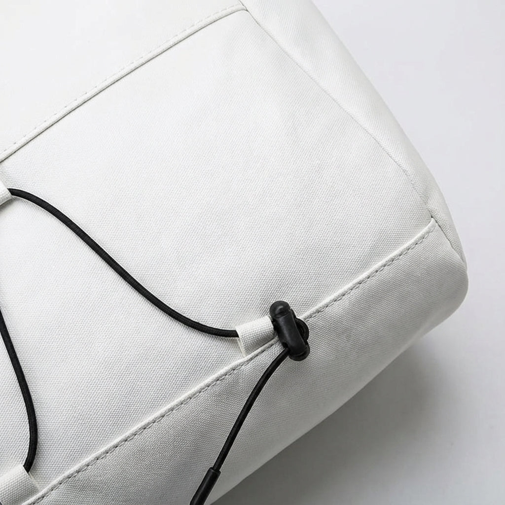 Durable unisex duffel bag for travel or gym. Waterproof design with a convenient shoe compartment for organized packing.