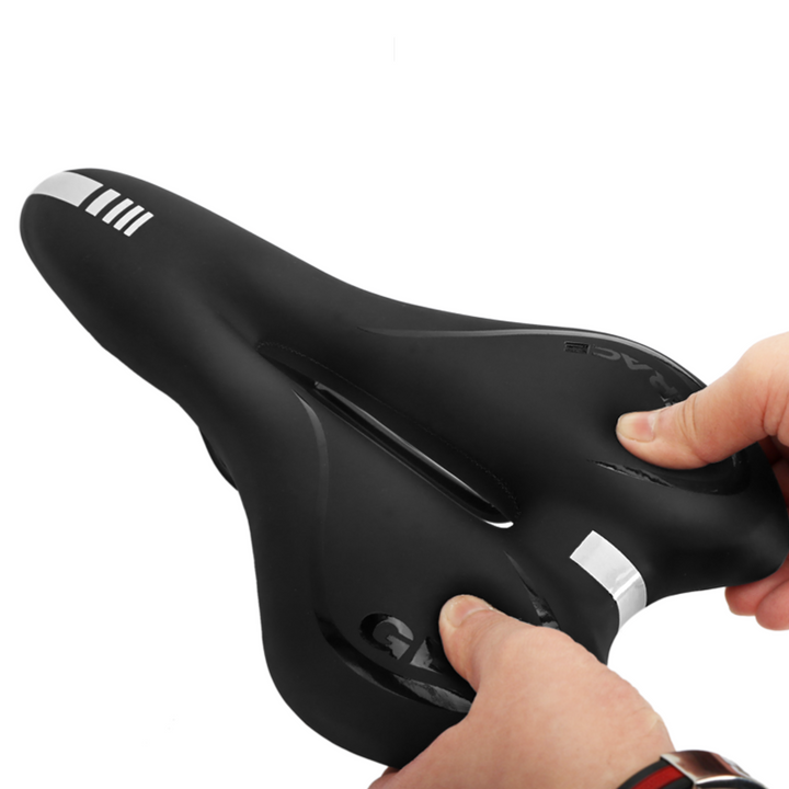 Side profile of a comfortable gel padded bike saddle, ideal for extended cycling trips.