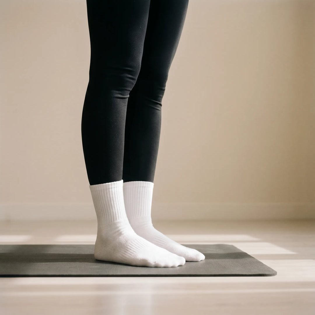 Unisex grippy crew socks for Pilates, yoga, and studio fitness workouts. Non-slip design for secure movement.