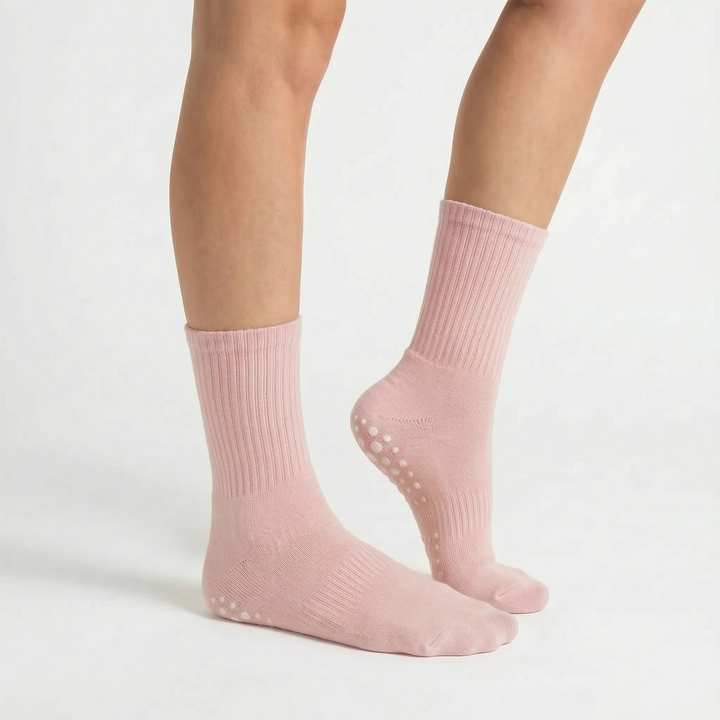 Crew length grippy active socks for Pilates, yoga, and studio fitness. Unisex non-slip design for better balance.