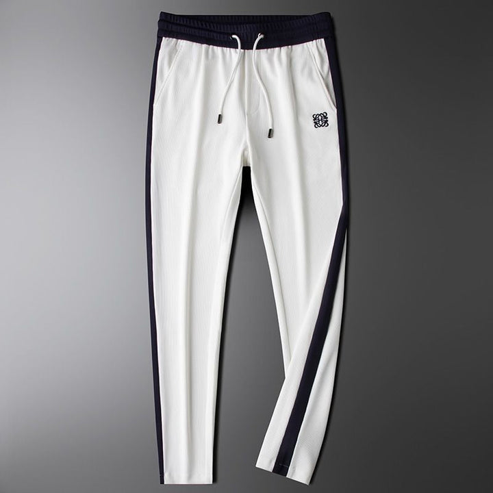 Unisex Hali Comfort Pants in black, featuring an adjustable drawstring for versatile casual, lounge, or athletic wear.