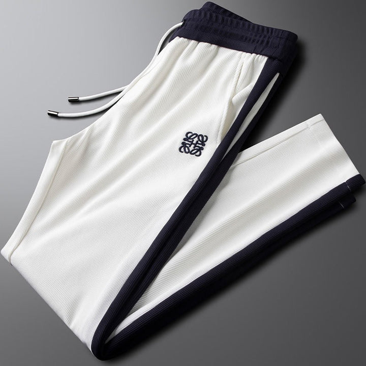 Flexible Unisex Hali Comfort Pants with a drawstring waist, perfect for everyday casual, lounge, and athletic style.