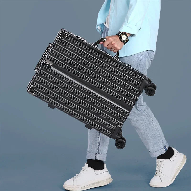 Smooth-rolling 360-degree spinner wheels & telescopic handle on durable travel luggage.