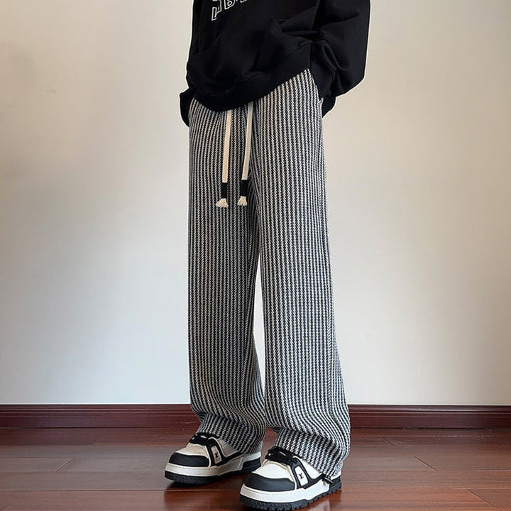 Comfortable unisex herringbone style joggers with a relaxed fit, ideal for stylish loungewear.