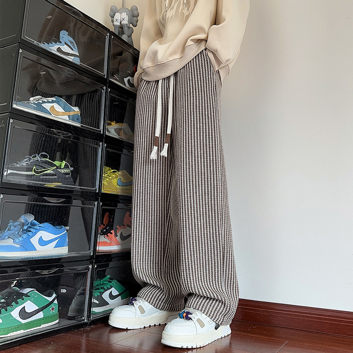 Brown unisex herringbone wide leg sweatpants, featuring a comfortable relaxed fit & drawstring.