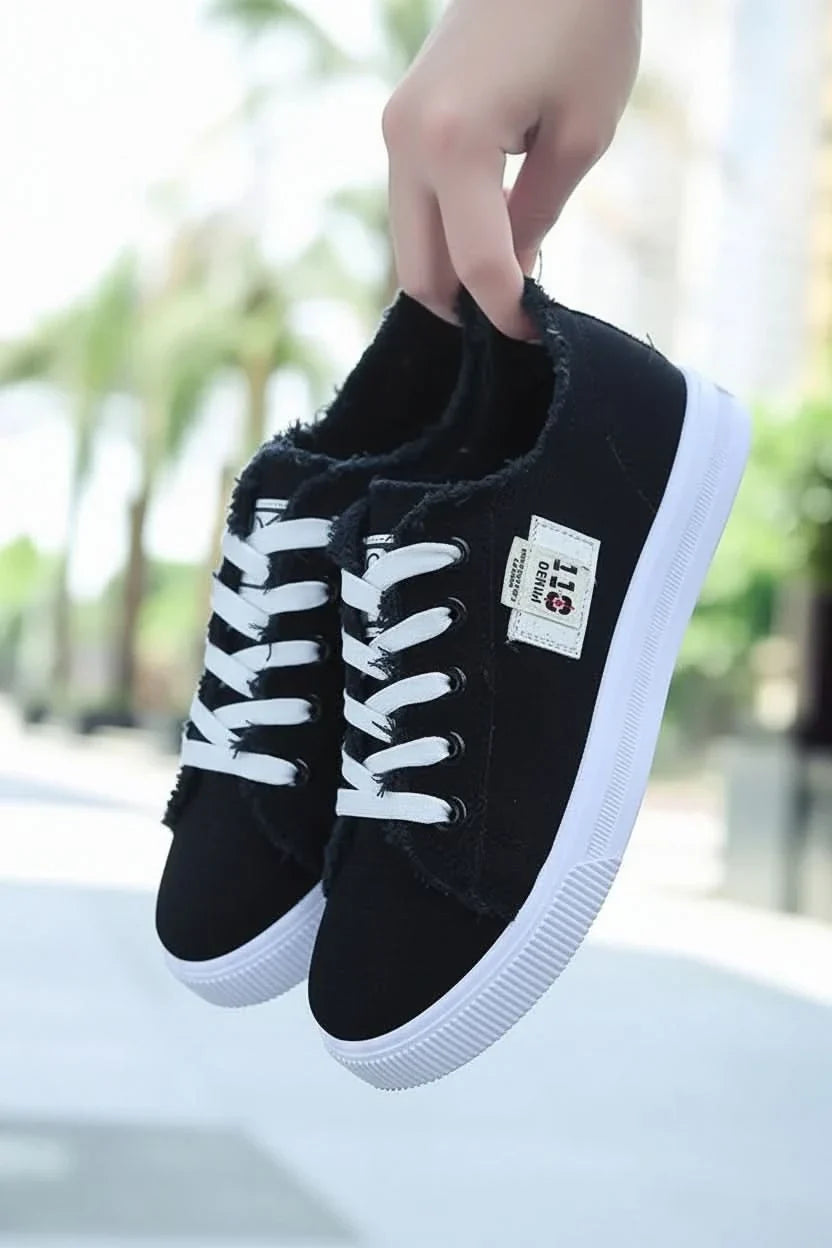 Comfortable unisex high-top sneakers, classic lace-up design for versatile everyday casual footwear.